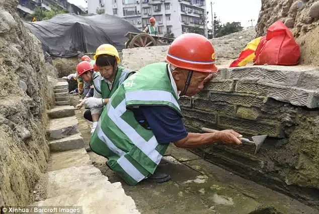 The Fugan Temple was a famous place of worship that existed from the Eastern Jin Dynasty (317-420) to the Southern Song Dynasty (1127-1279). Pictured are archaeologists working on the site